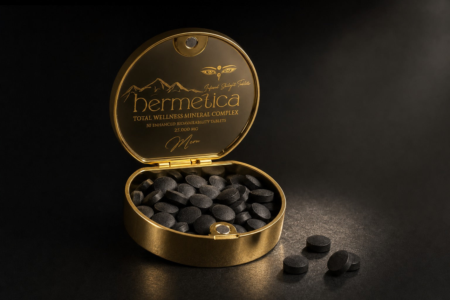 Hermetica Meru peppermint-infused shilajit tablets in an open mirrored gold compact